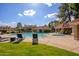 Inviting pool and spa area with lounge chairs and covered seating at 1633 E Lakeside Dr # 45, Gilbert, AZ 85234