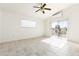 Bright bedroom with tile floors, a ceiling fan, and access to a private balcony at 17149 E El Pueblo Blvd, Fountain Hills, AZ 85268