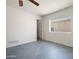 Bedroom with tile floors, a window, and access to a bathroom at 17149 E El Pueblo Blvd, Fountain Hills, AZ 85268