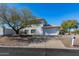 Two-story house with tile roof, attached garage, and desert landscaping at 17149 E El Pueblo Blvd, Fountain Hills, AZ 85268