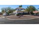 Two-story house with tile roof and desert landscaping, gated entry at 17149 E El Pueblo Blvd, Fountain Hills, AZ 85268