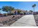 Two-story house with tile roof, landscaping, and gated entry at 17149 E El Pueblo Blvd, Fountain Hills, AZ 85268