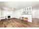 Living room with wood floors, fireplace, and built in shelving at 17149 E El Pueblo Blvd, Fountain Hills, AZ 85268