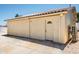 Detached storage building with a door and AC unit at 17149 E El Pueblo Blvd, Fountain Hills, AZ 85268