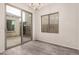 Breakfast nook with sliding glass door leading to backyard at 1820 N 94Th Gln, Phoenix, AZ 85037