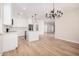 Bright dining room with chandelier and hardwood floors at 19430 E Erik Ct, Florence, AZ 85132