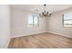 Spacious dining room with hardwood floors and chandelier at 19430 E Erik Ct, Florence, AZ 85132