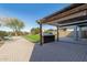 Outdoor kitchen and pergola in a spacious backyard at 1956 W Black Hill Rd, Phoenix, AZ 85085