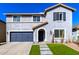 Two-story house with gray siding, a two-car garage, and a landscaped front yard at 1956 W Black Hill Rd, Phoenix, AZ 85085