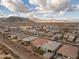 Aerial view of neighborhood with mountain views at 19587 W Marshall Ave, Litchfield Park, AZ 85340