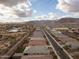 Aerial view of neighborhood with street and houses at 19587 W Marshall Ave, Litchfield Park, AZ 85340