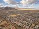 Wide aerial view of the neighborhood and mountains at 19587 W Marshall Ave, Litchfield Park, AZ 85340