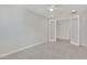 Bright bedroom with French doors and ceiling fan at 19587 W Marshall Ave, Litchfield Park, AZ 85340