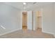 Bright bedroom featuring a ceiling fan and walk-in closet at 19587 W Marshall Ave, Litchfield Park, AZ 85340