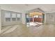 Bright dining area with tile floors and sliding glass doors leading to a patio at 19587 W Marshall Ave, Litchfield Park, AZ 85340