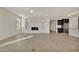 Spacious living room featuring a fireplace and tile flooring at 19587 W Marshall Ave, Litchfield Park, AZ 85340