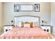 Main bedroom with a queen-size bed and rustic-style nightstands at 22235 E Cherrywood Dr, Queen Creek, AZ 85142