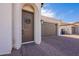 Close-up of the front door and brick driveway leading to the garage at 22235 E Cherrywood Dr, Queen Creek, AZ 85142