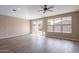 Bright living room with a sliding glass door and views of the backyard at 22235 E Cherrywood Dr, Queen Creek, AZ 85142