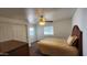 Cozy bedroom with double closet and ceiling fan at 2233 E Behrend Dr # 61, Phoenix, AZ 85024