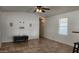 Living room with tile floors, ceiling fan, and recessed lighting at 2233 E Behrend Dr # 61, Phoenix, AZ 85024