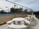 Community tennis court with seating area and mountain views at 2233 E Behrend Dr # 61, Phoenix, AZ 85024