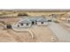 Aerial view of a single-story house with a large backyard and paved driveway at 22707 W La Mirada Dr, Buckeye, AZ 85326