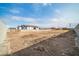 Large lot with new home and outbuildings at 22707 W La Mirada Dr, Buckeye, AZ 85326