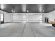 Spacious two-car garage with high ceilings at 22707 W La Mirada Dr, Buckeye, AZ 85326