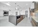 Large kitchen island with contemporary finishes and open layout at 22707 W La Mirada Dr, Buckeye, AZ 85326