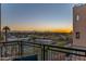 Balcony view features sunset over city and mountain range at 2302 N Central Ave # 401, Phoenix, AZ 85004