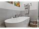 Relaxing bathroom with a large free-standing tub and modern fixtures at 2302 N Central Ave # 401, Phoenix, AZ 85004