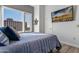 Spacious bedroom with city views and large TV at 2302 N Central Ave # 401, Phoenix, AZ 85004