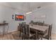 Bright dining room with a large table, six chairs, and a modern light fixture at 2302 N Central Ave # 401, Phoenix, AZ 85004