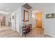 Light and airy entryway with wood-look flooring and a stylish console table at 2302 N Central Ave # 401, Phoenix, AZ 85004