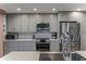 Modern kitchen with stainless steel appliances and white subway tile backsplash at 2302 N Central Ave # 401, Phoenix, AZ 85004