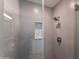 Modern glass-enclosed shower with mosaic tile detail at 2302 N Central Ave # 401, Phoenix, AZ 85004