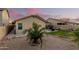 Landscaped backyard with patio and seating area at 24246 W Tonto St, Buckeye, AZ 85326