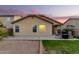 Backyard patio with seating and grill area at 24246 W Tonto St, Buckeye, AZ 85326