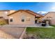 Backyard with patio, grass, and seating area at 24246 W Tonto St, Buckeye, AZ 85326