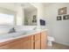 Double vanity bathroom with a toilet at 24246 W Tonto St, Buckeye, AZ 85326