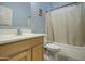 Clean bathroom with a shower/tub combo at 2524 W Saint Catherine Ave, Phoenix, AZ 85041