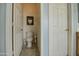 Small bathroom with toilet and door at 2524 W Saint Catherine Ave, Phoenix, AZ 85041