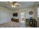 Main bedroom with large bed, dresser and office area at 2524 W Saint Catherine Ave, Phoenix, AZ 85041