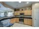 Kitchen features stainless steel appliances and ample cabinetry at 2524 W Saint Catherine Ave, Phoenix, AZ 85041