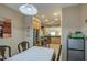 Kitchen with stainless steel appliances and light wood cabinets at 2524 W Saint Catherine Ave, Phoenix, AZ 85041