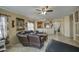 Spacious living room with a view into the kitchen at 2524 W Saint Catherine Ave, Phoenix, AZ 85041