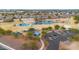 An aerial view shows the park's multiple ponds, playgrounds, parking, and green spaces at 2646 E Megan St, Gilbert, AZ 85295