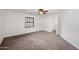 Bright bedroom featuring neutral carpet and a window at 2646 E Megan St, Gilbert, AZ 85295