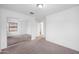 Bedroom with neutral carpet features a window and closet with mirrored sliding doors at 2646 E Megan St, Gilbert, AZ 85295